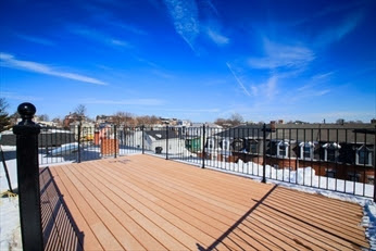 A deck with a view of the city.